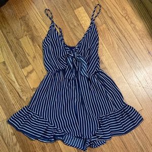 Blue and white striped romper with tie in the middle Size: M